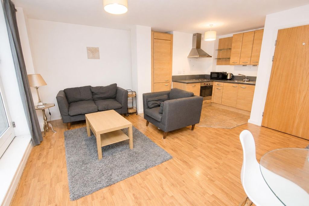 Property photo 2 of 9 Spacious Open-Plan Living Room And Modern Kitchen...