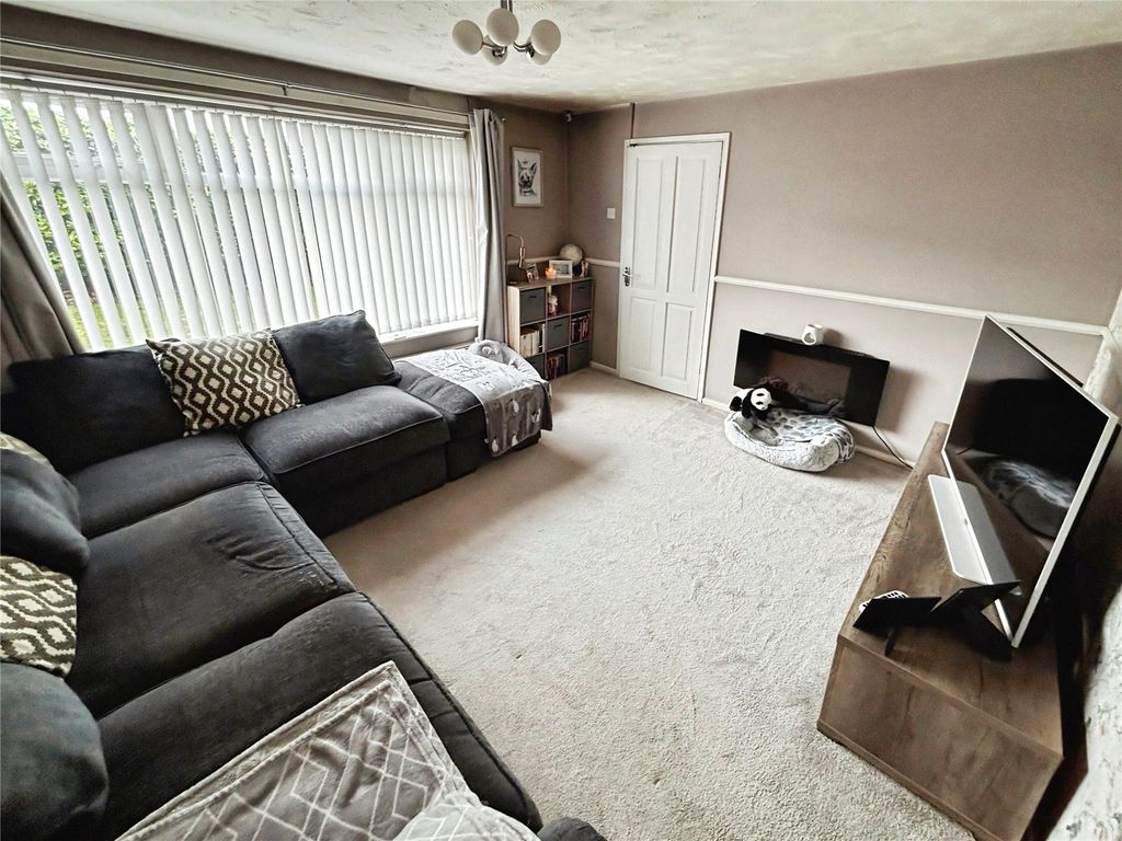 Property photo 2 of 13 Living Area