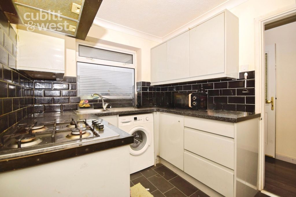 Property photo 2 of 12 Kitchen