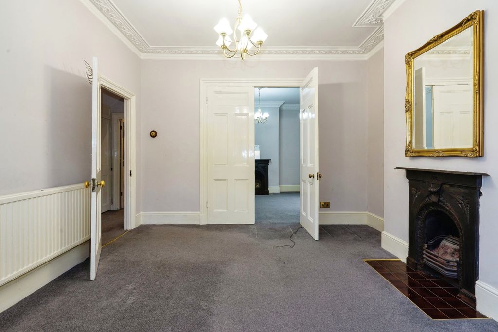 Property photo 3 of 12 Living Area