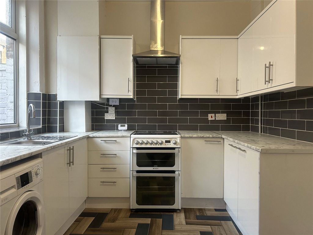 Property photo 3 of 13 Kitchen