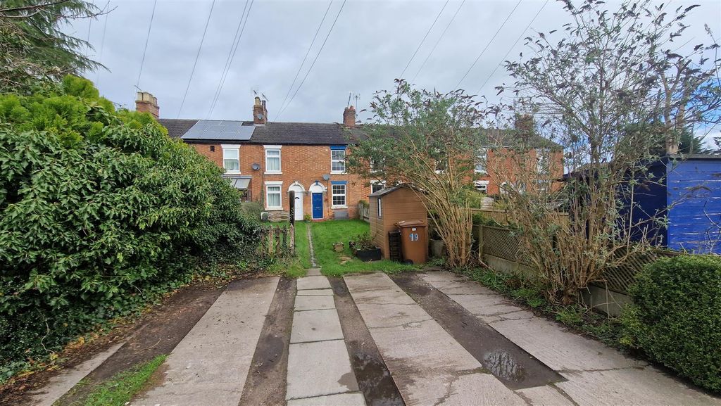 Property photo 2 of 9 Driveway - 1 Bay