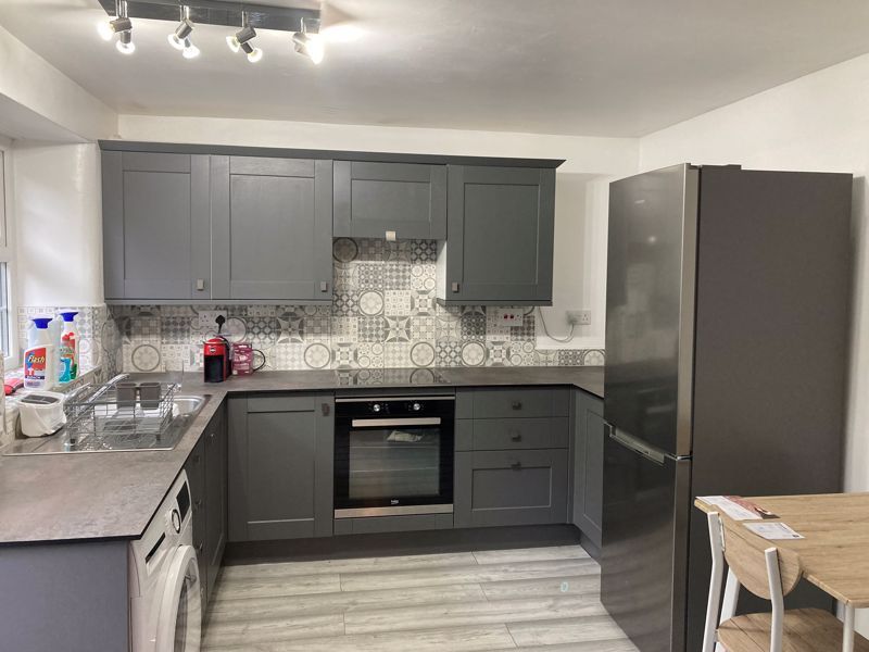 Property photo 3 of 12 Kitchen