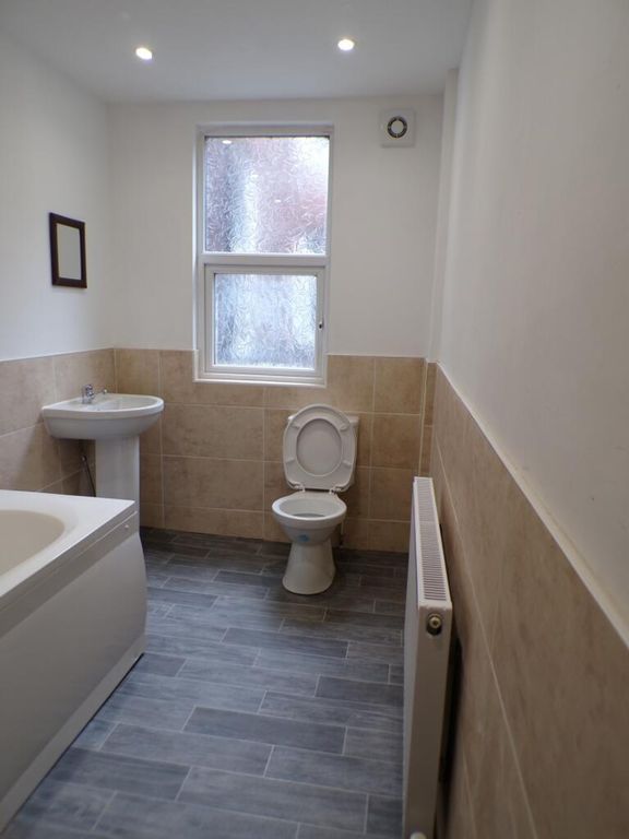 Property photo 3 of 9 A Modern Bathroom Featuring A Stylish Bathtub, Sle...