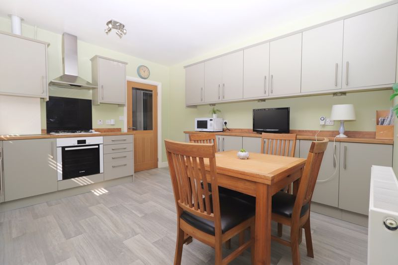 Property photo 2 of 24 Dining Kitchen