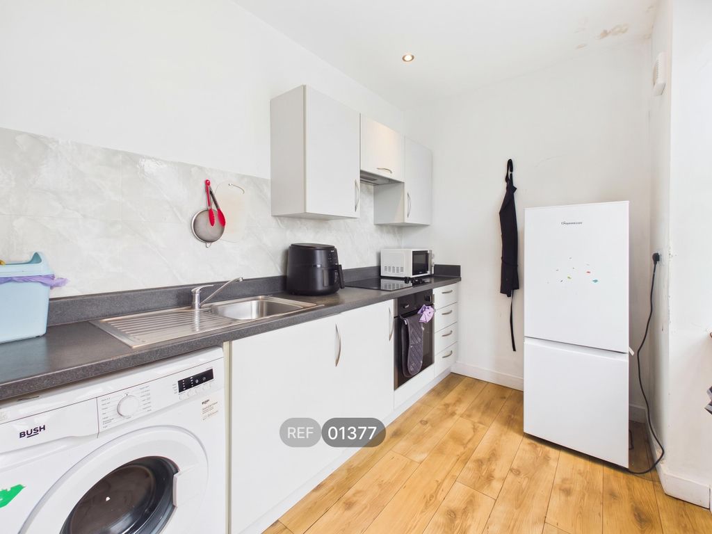 Property photo 1 of 6 Kitchen/Living Area