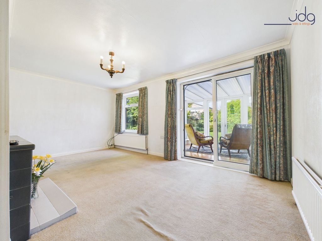 Property photo 3 of 16 Living Room With Patio Doors To The Conservatory