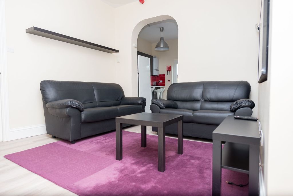 Property photo 3 of 14 Bright, Modern Lounge With Two Black Leather Sofas...