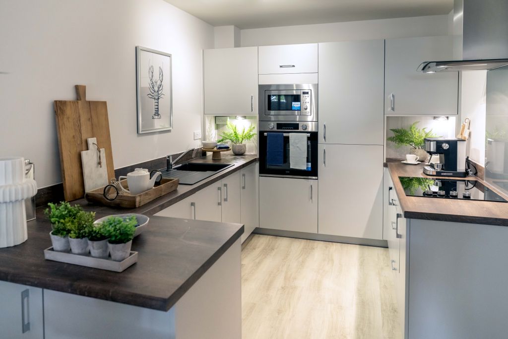 Property photo 2 of 7 Typical Kitchen