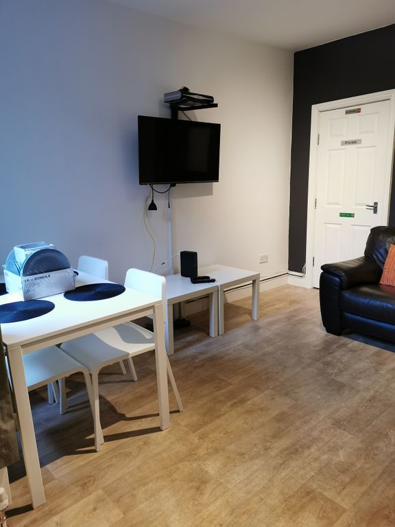 Property photo 2 of 25 Bright, Modern Living Area With Wood-Effect Floori...