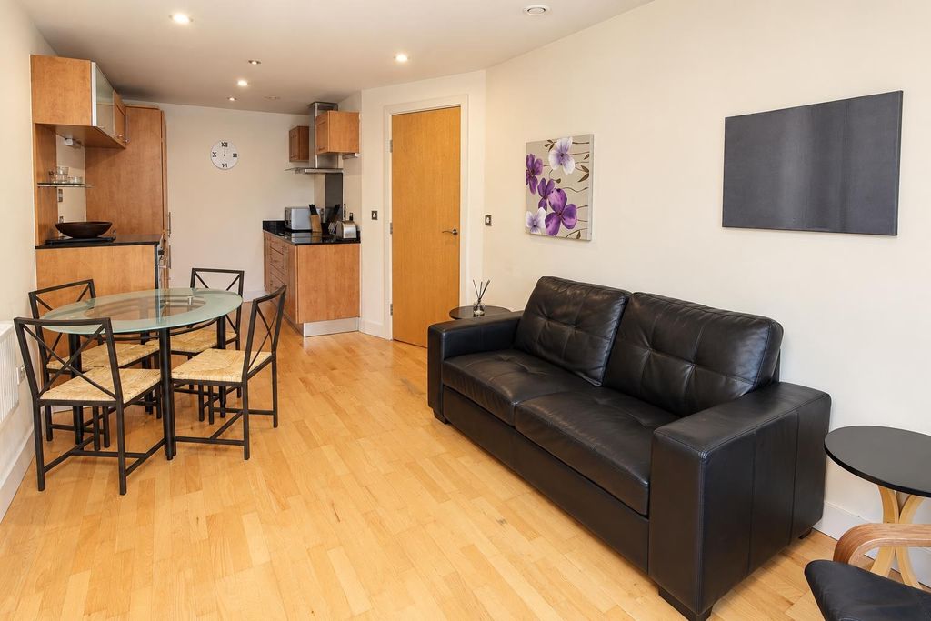Property photo 3 of 8 Open-Plan Living Room With Dining Area And Sofa...