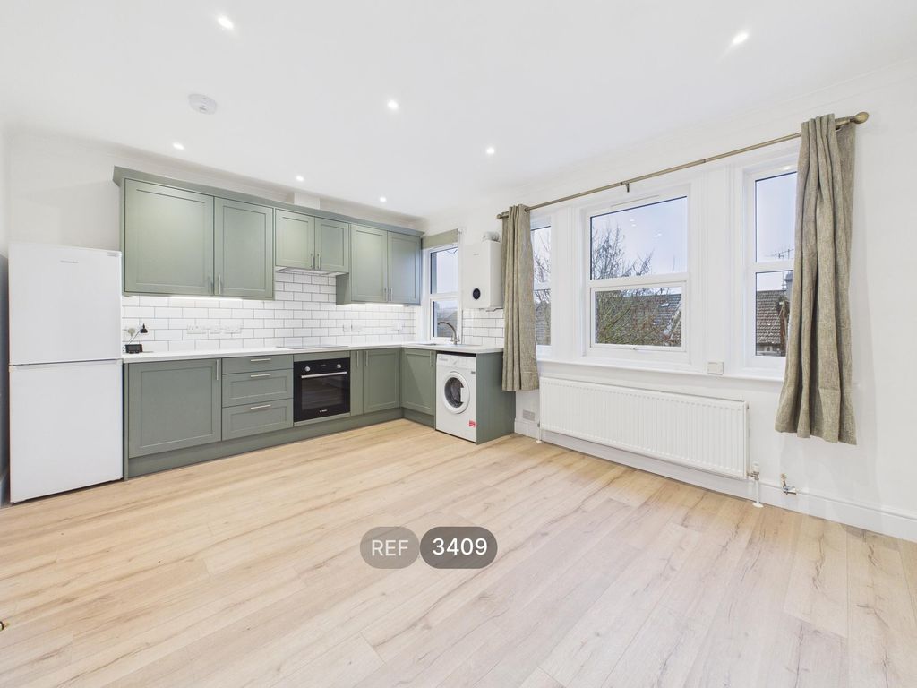 Property photo 2 of 7 Kitchen / Living Area