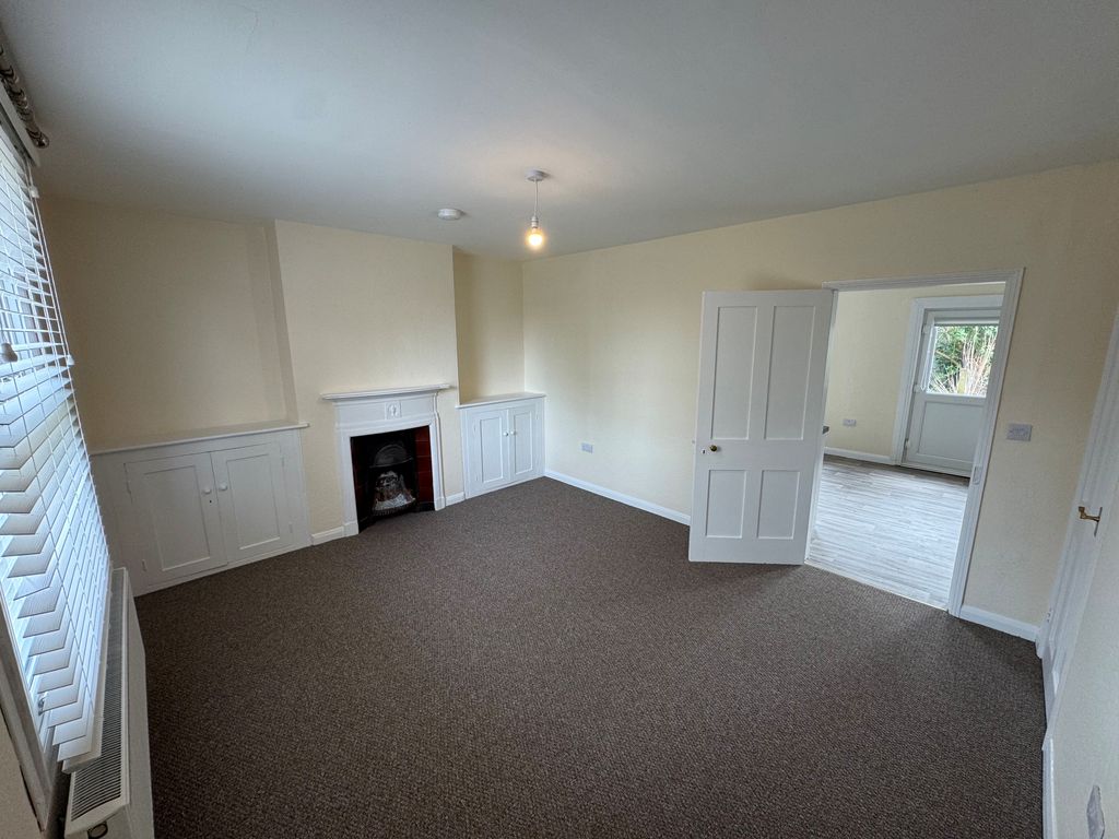 Property photo 3 of 11 Front