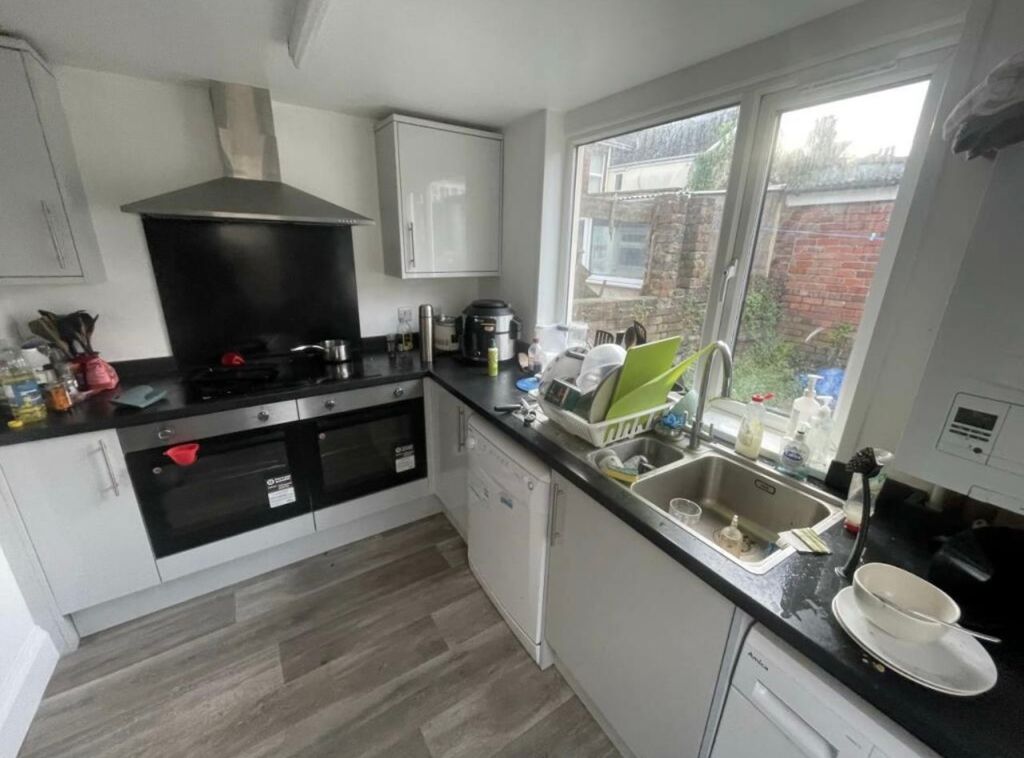 Property photo 1 of 11 Bright Galley Kitchen With Large Window Overlookin...