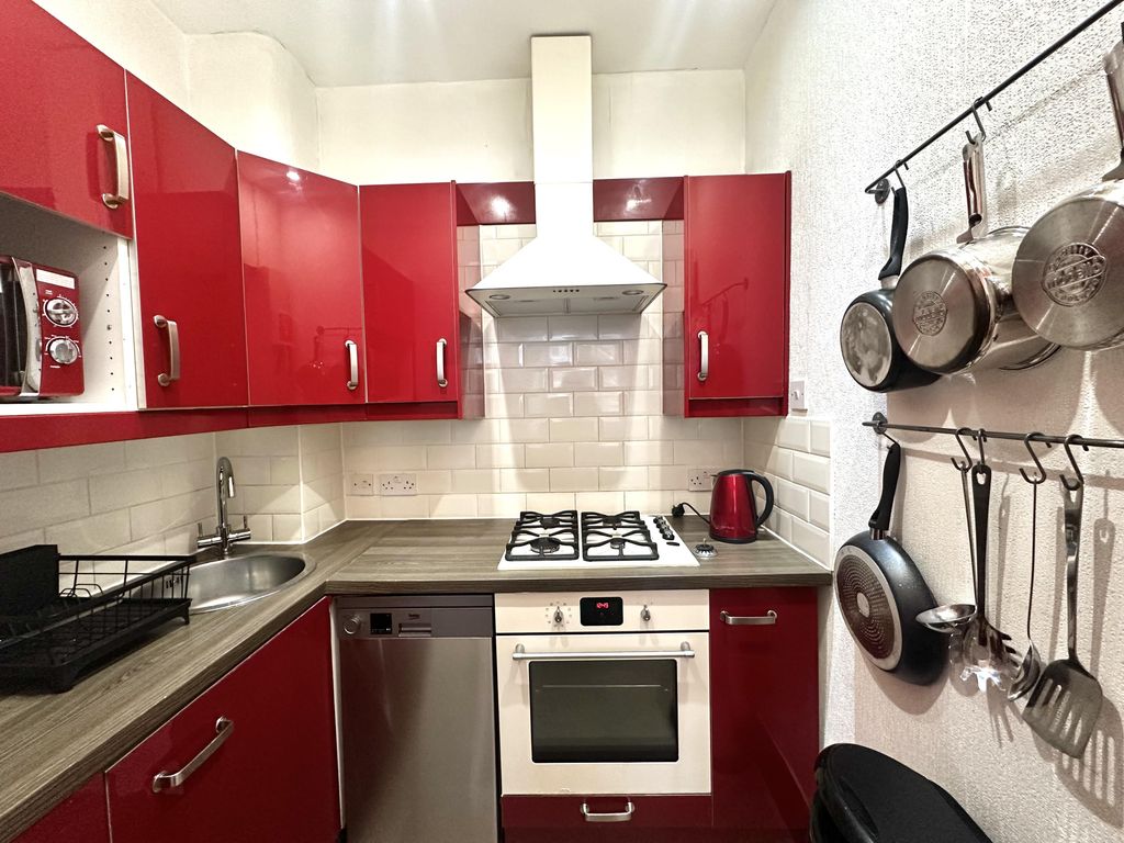 Property photo 3 of 11 Kitchen