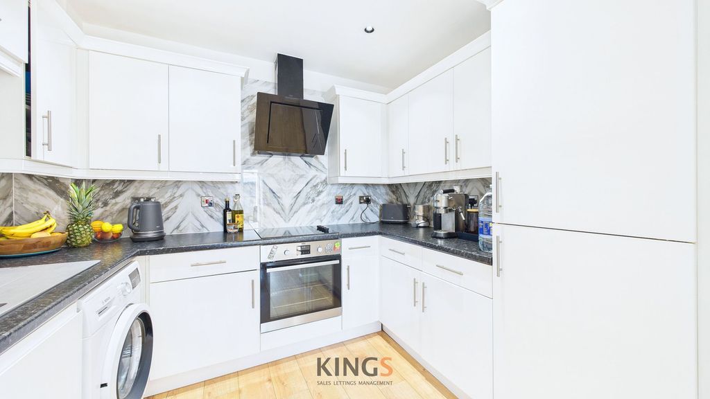 Property photo 3 of 8 Kitchen
