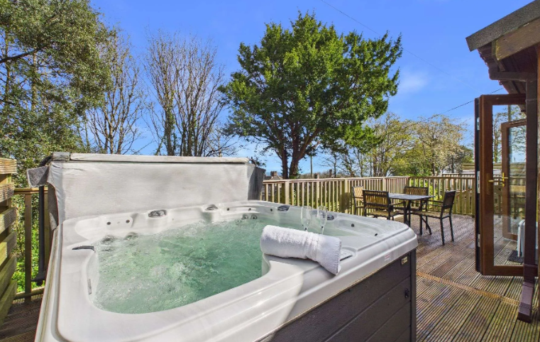 Property photo 1 of 10 Private Hot Tub On The Decking Of The Deluxe Castle View Holiday Lodge