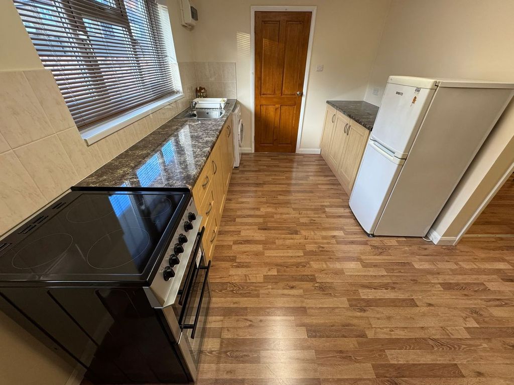 Property photo 3 of 10 Kitchen Area