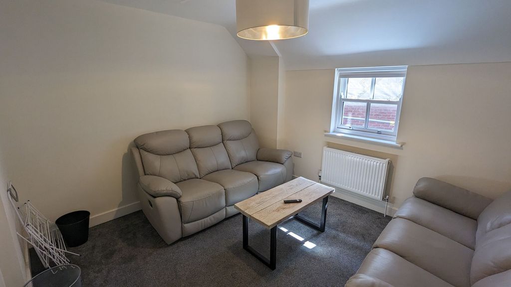 Property photo 1 of 8 Living Area