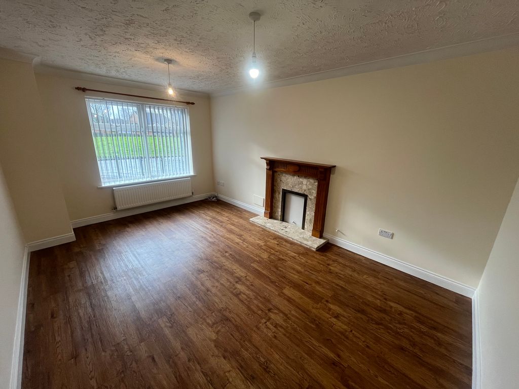 Property photo 3 of 12 Living Room