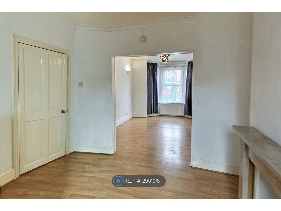 Property photo 3 of 11 Dining Room And Living Room From Rear Wall