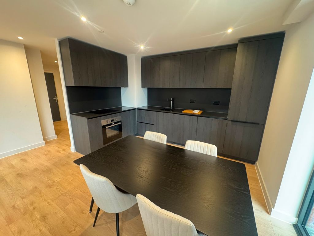 Property photo 3 of 12 Kitchen &amp; Dining