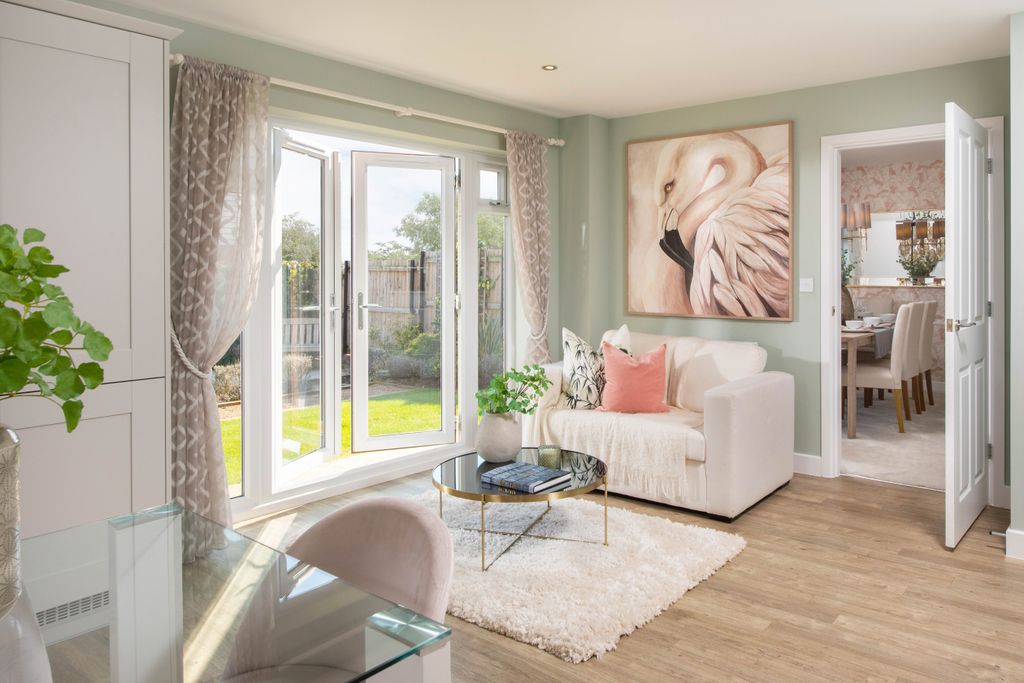 Property photo 3 of 10 View Of The Family Area In The Kitchen In The Lichfield 5 Bedroom Home