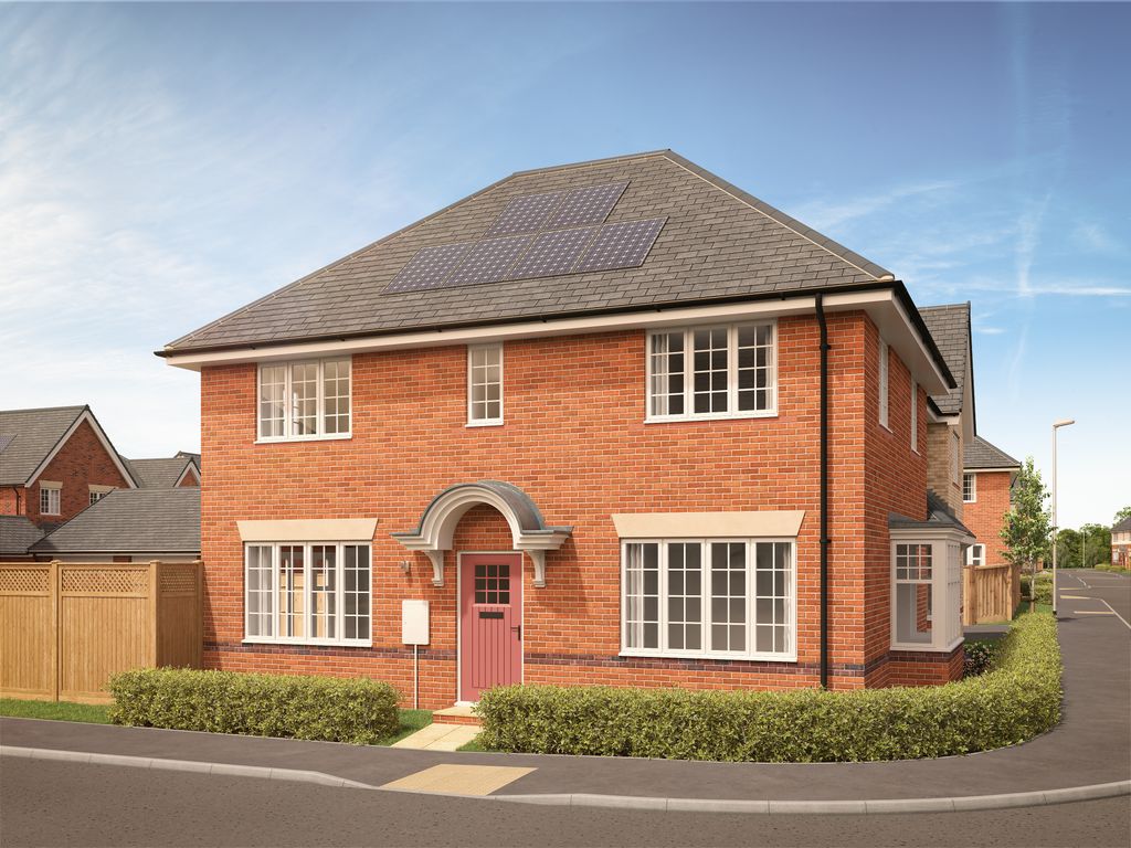 Property photo 1 of 9 A Brick House With A Pink Door And Manicured Hedges In The Foreground Sits Under A Bright Blue Sky W
