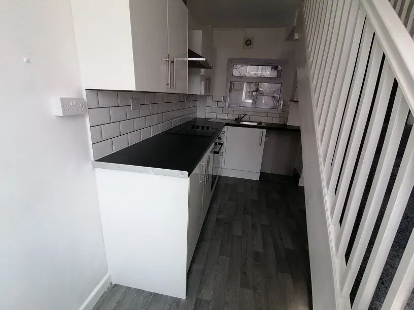 Property photo 2 of 8 Kitchen