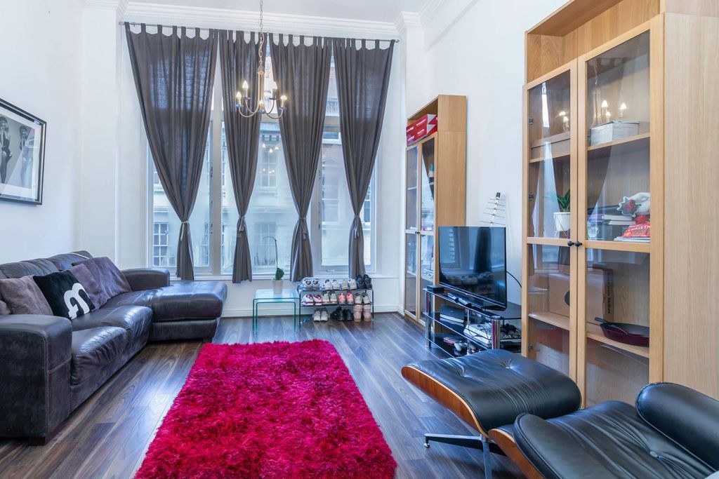 Property photo 1 of 10 Living Area