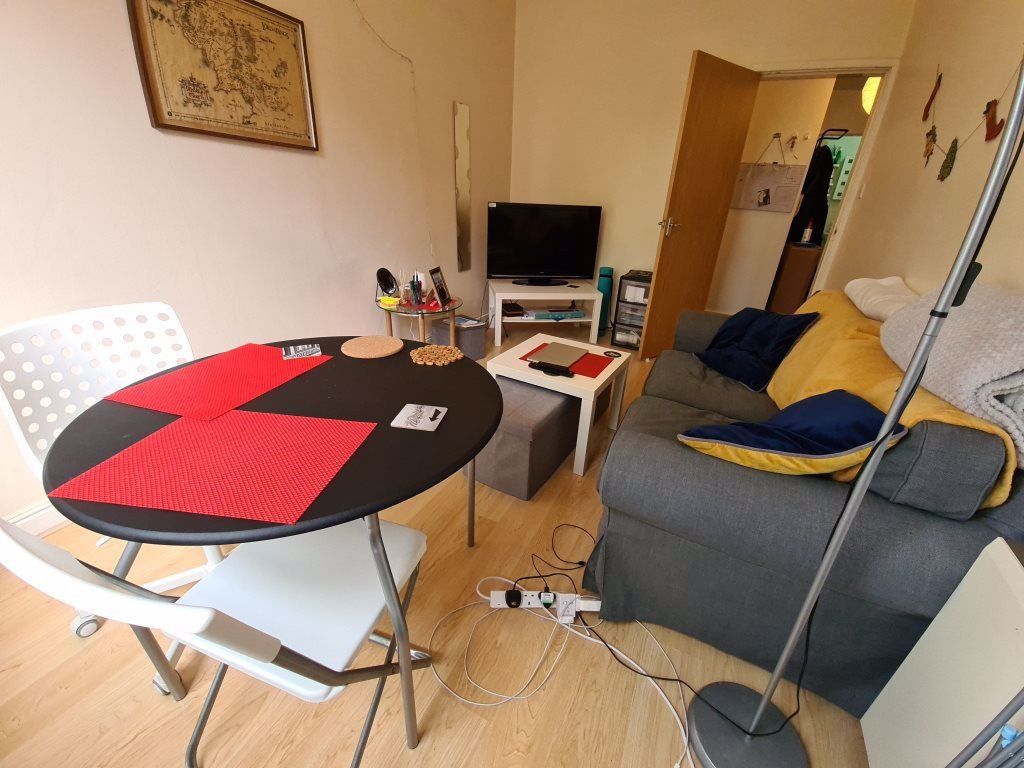 Property photo 3 of 8 Cozy Living Space Featuring A Comfortable Sofa Wit...