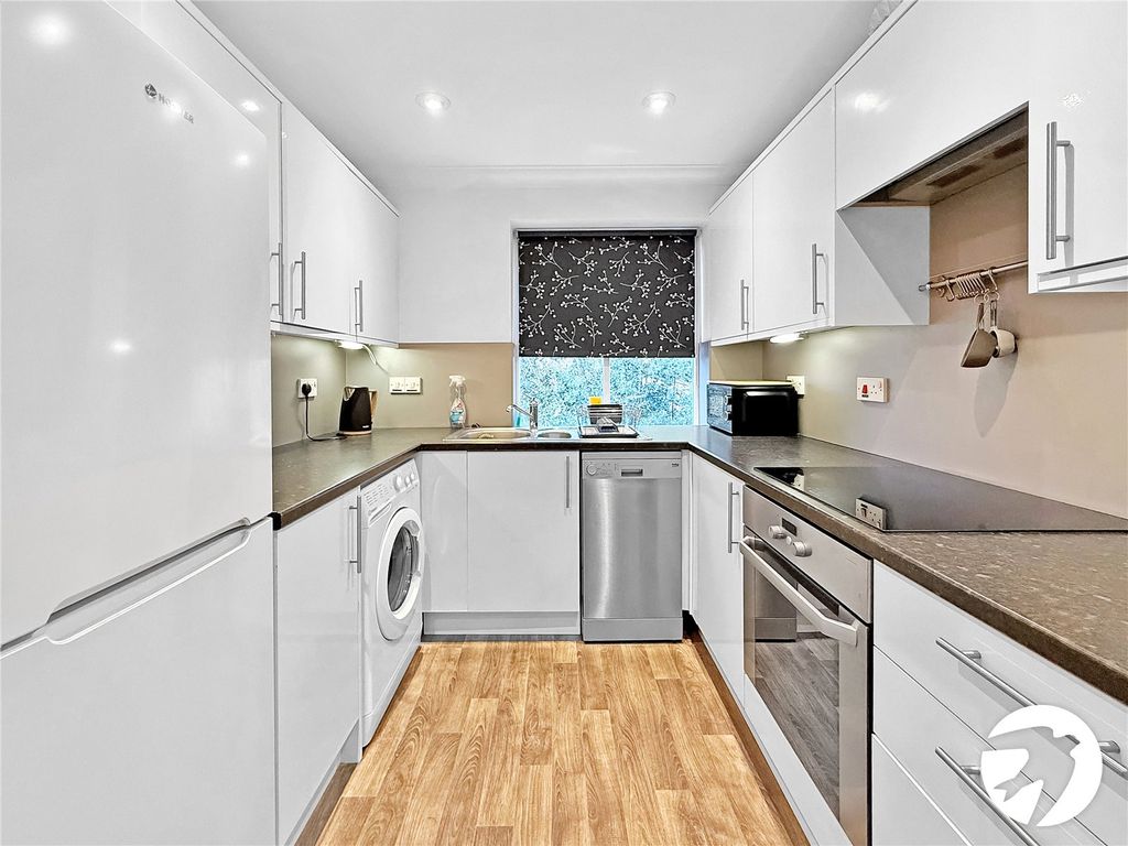 Property photo 3 of 12 Kitchen