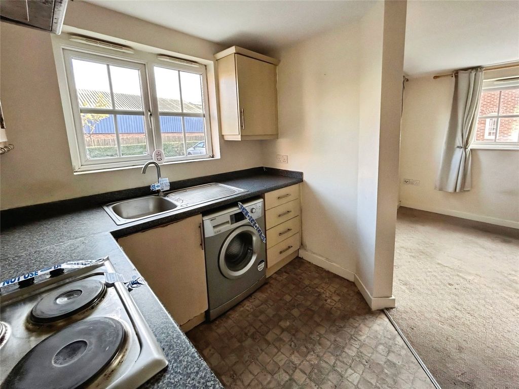 Property photo 3 of 8 Kitchen