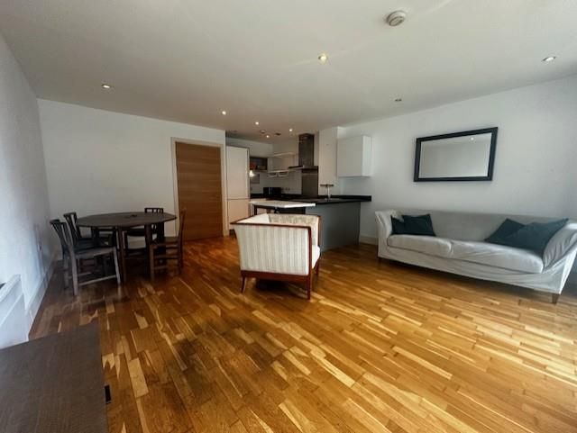 Property photo 3 of 12 Living Dining Kitchen Area Ub.Jpg