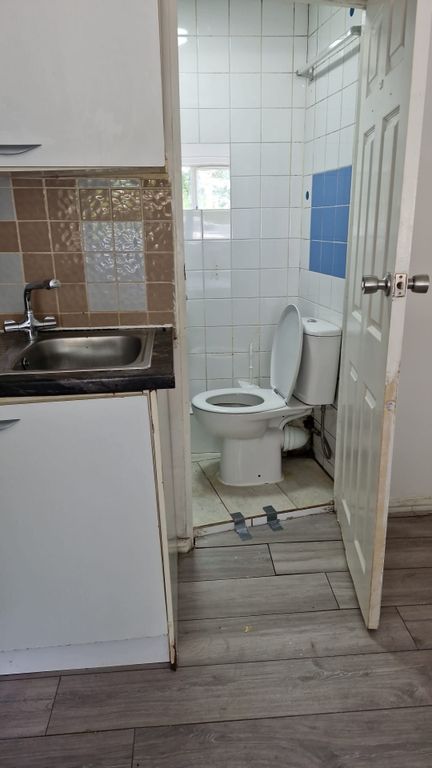 Property photo 2 of 4 Bright Tiled Bathroom With Functional Layout....