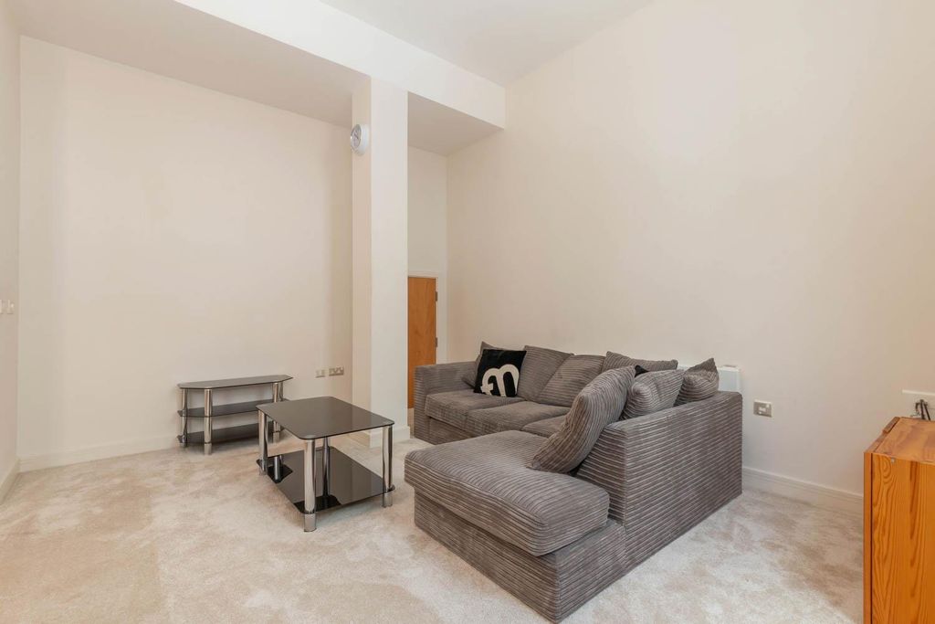 Property photo 3 of 13 Living Area