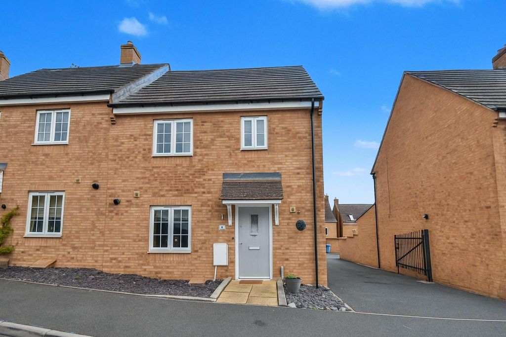 Property photo 1 of 24 Front Shot Blue Sky.Png