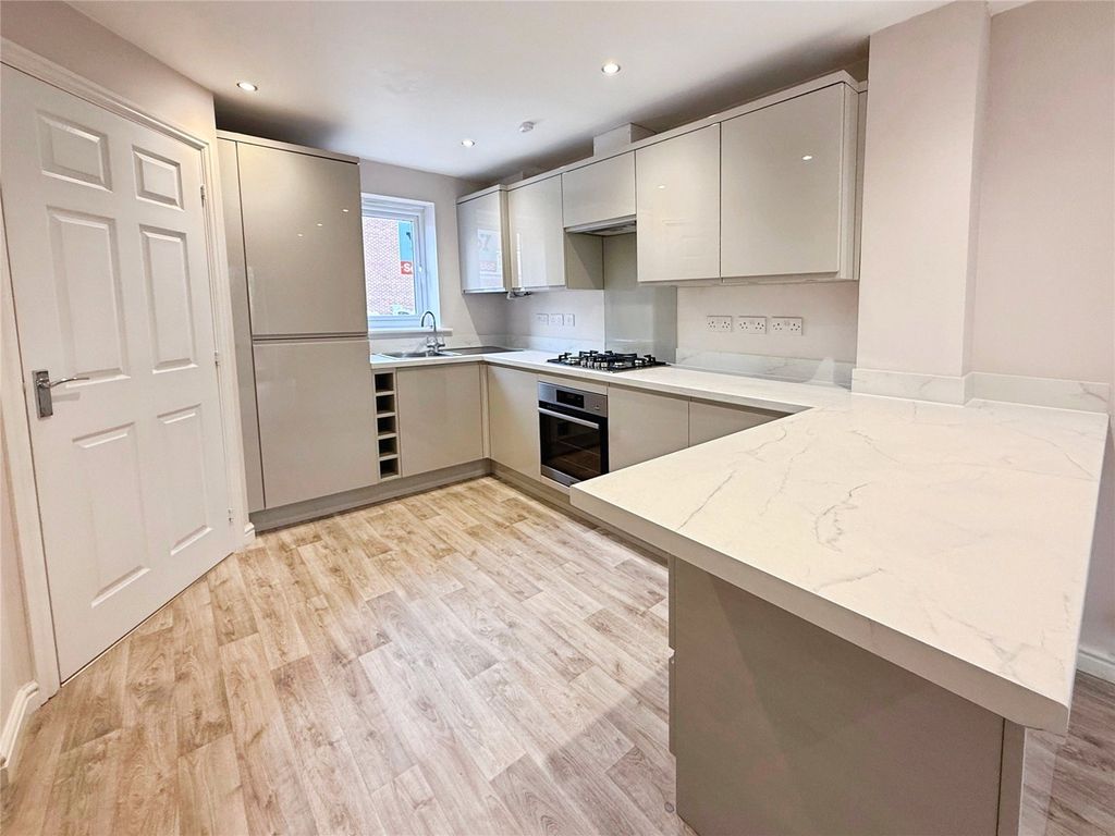 Property photo 2 of 12 Kitchen