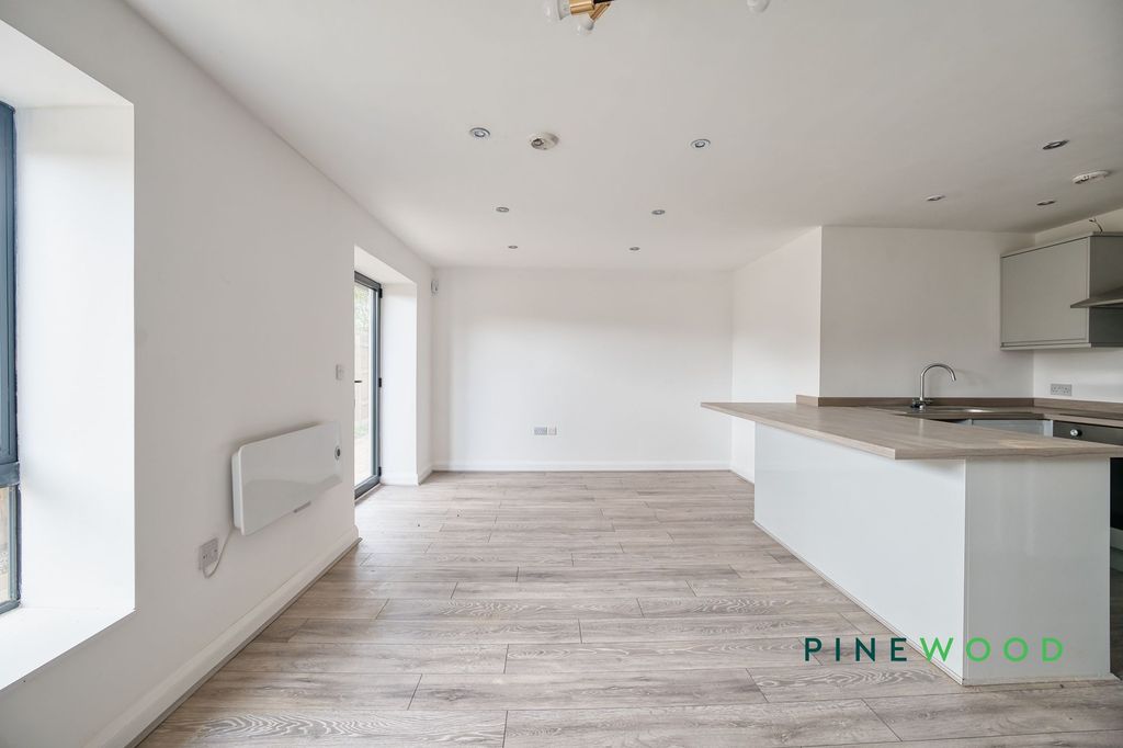 Property photo 3 of 12 Kitchen / Living Area