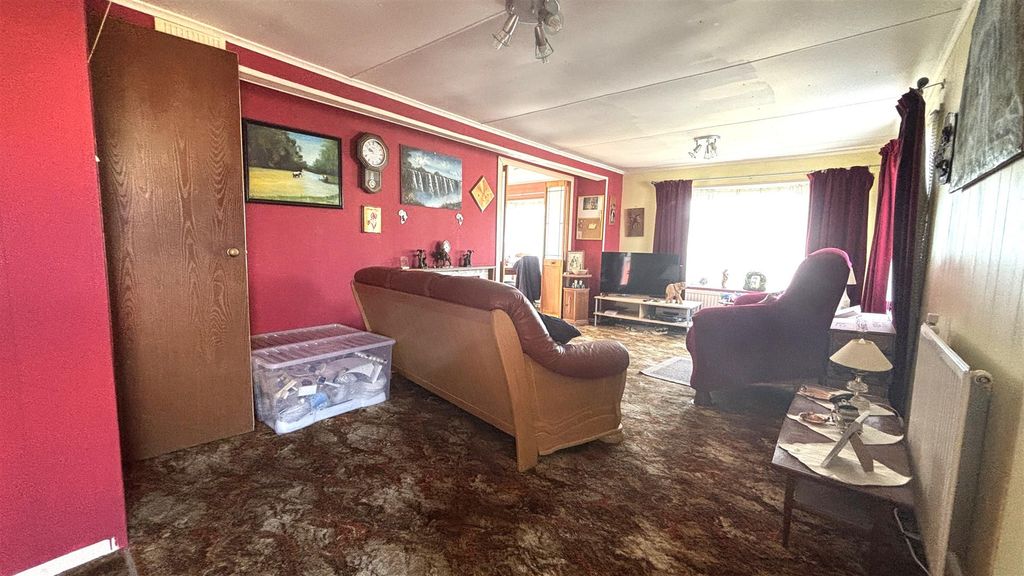 Property photo 2 of 12 Living Room