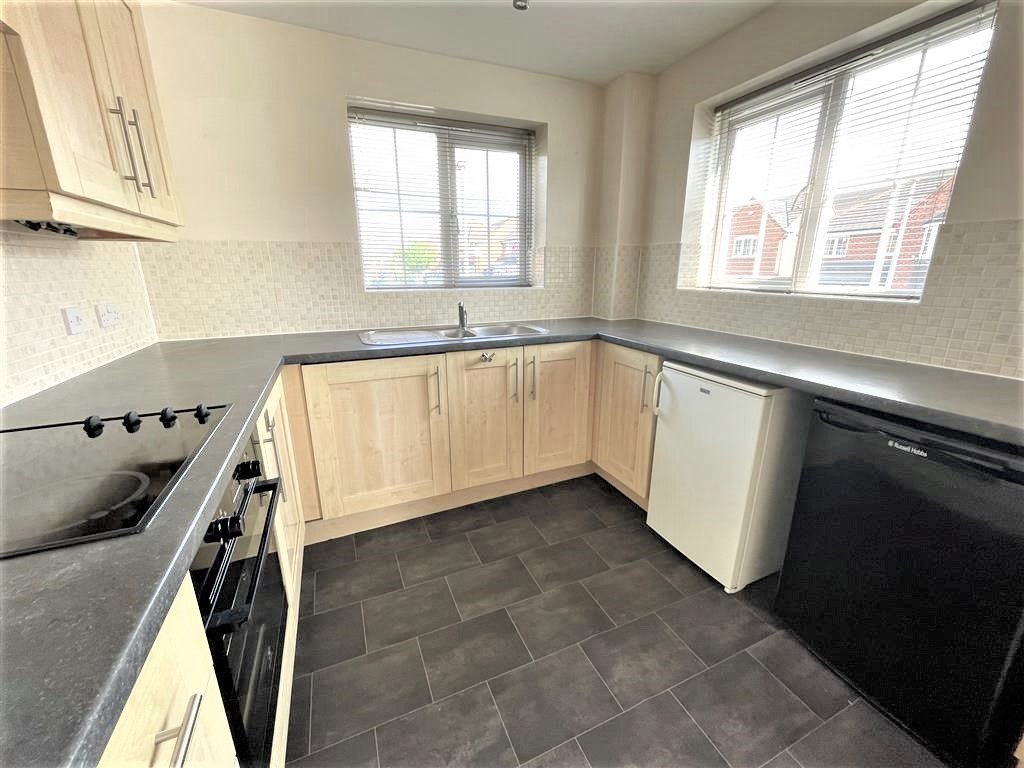 Property photo 3 of 7 Kitchen