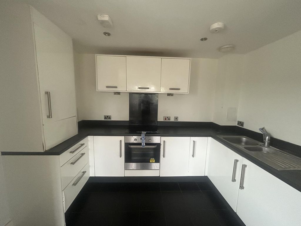 Property photo 2 of 8 Kitchen