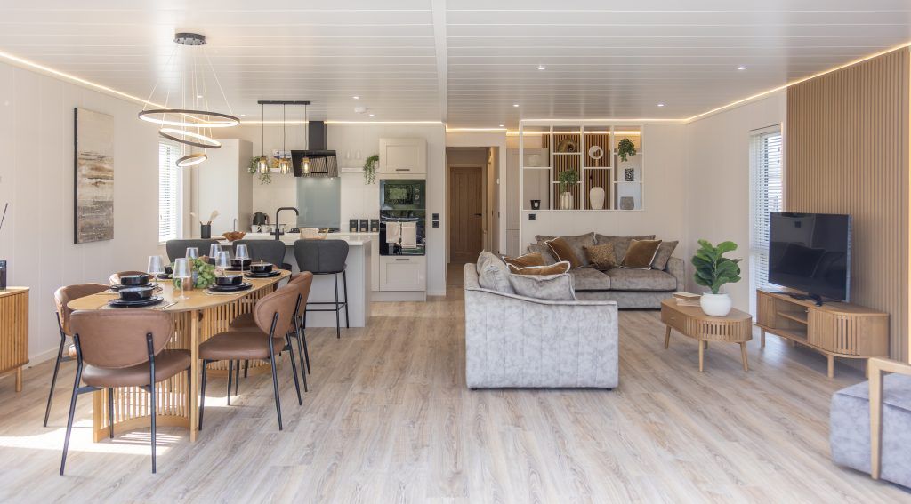 Property photo 2 of 23 Luxury Open-Plan Interior Of The Aspire Luna Lodge With Lounge, Dining Area And Modern Kitchen.