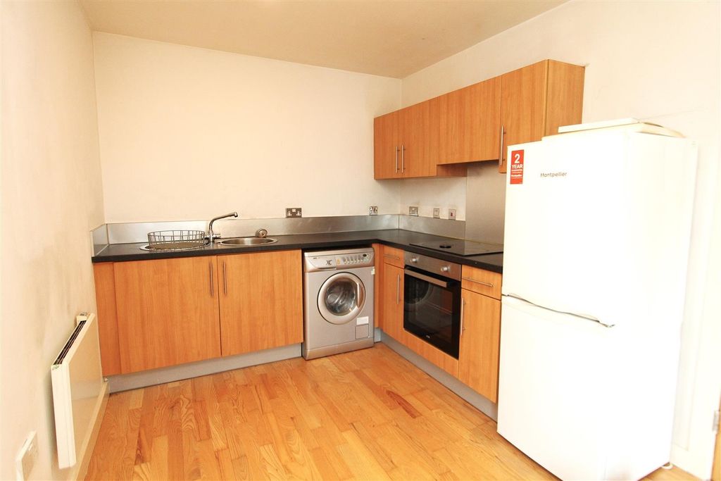 Property photo 3 of 7 Bright Kitchen With Modern Wooden Cabinetry...