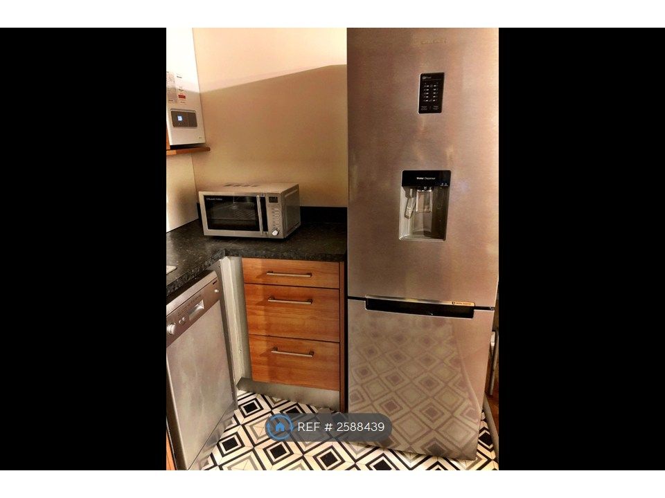 Property photo 3 of 7 Kitchen