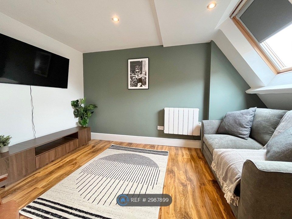 Property photo 1 of 12 Living Area