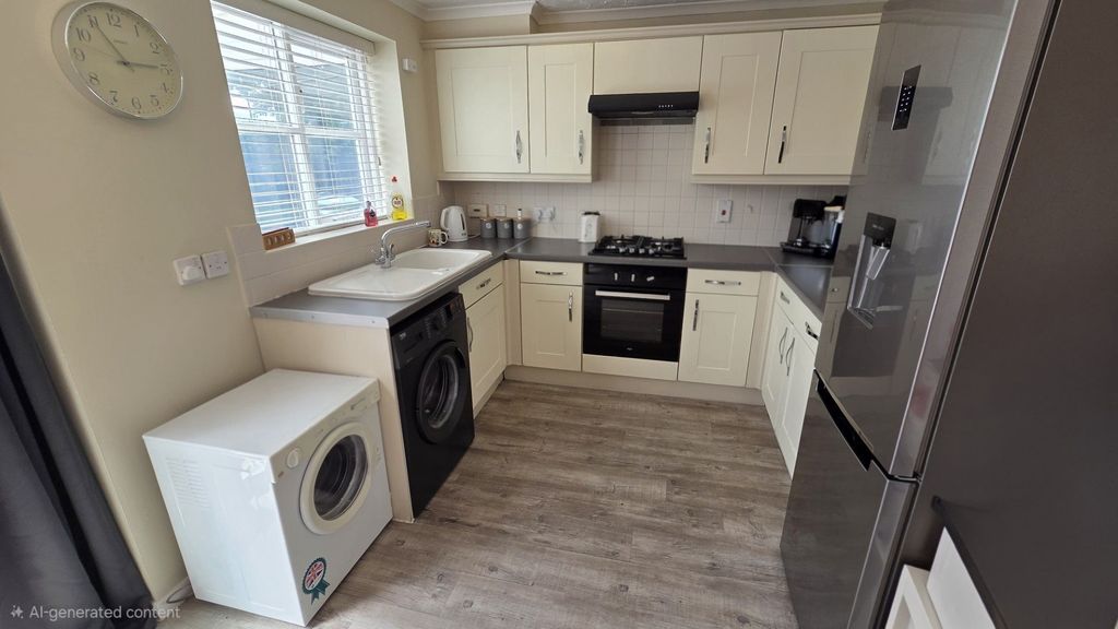 Property photo 3 of 13 Kitchen