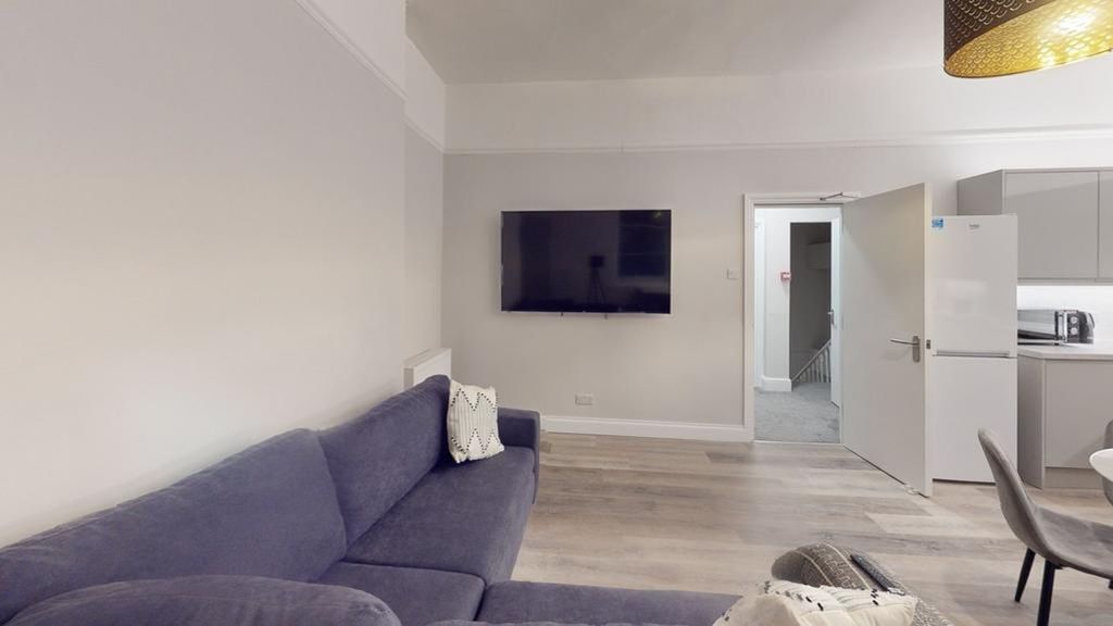 Property photo 1 of 22 A Spacious And Inviting Modern Living Room, Perfec...