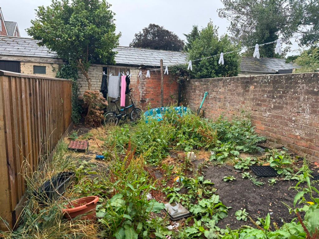 Property photo 2 of 8 Garden With Brick And Fenced Boundaries