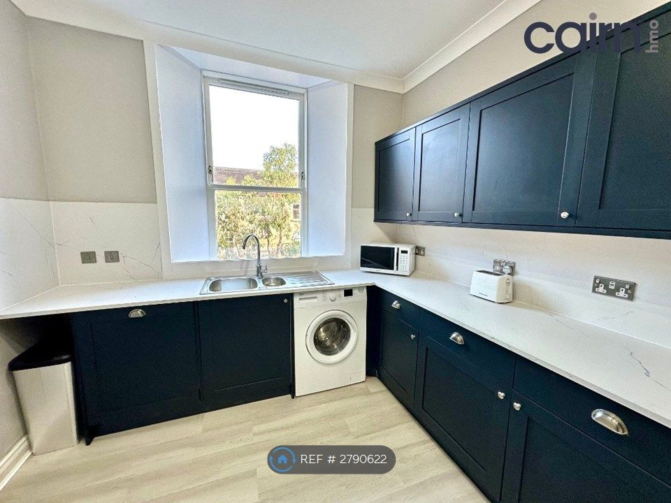 Property photo 2 of 13 Dining Kitchen
